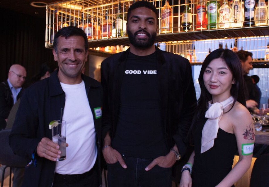 Maggi with two guests at a bar event