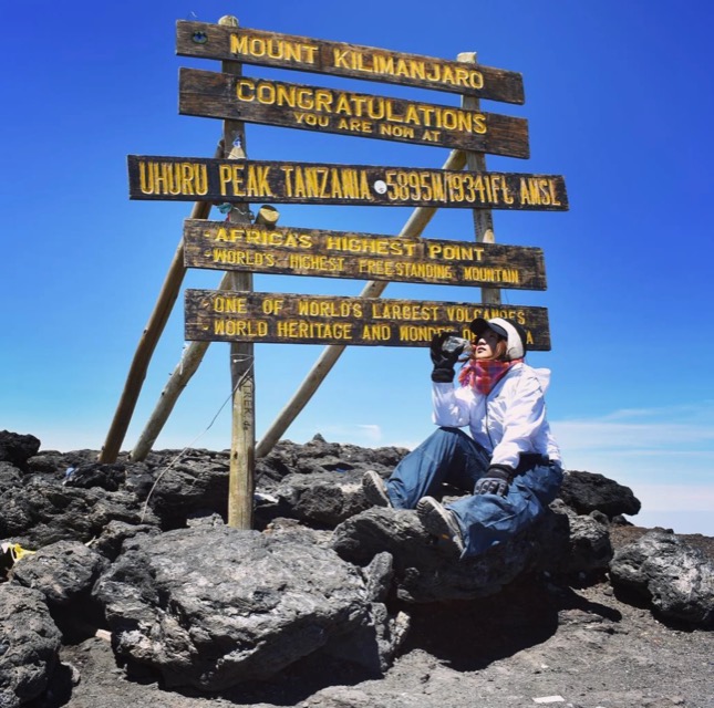 Maggi at the summit of Mount Kilimanjaro